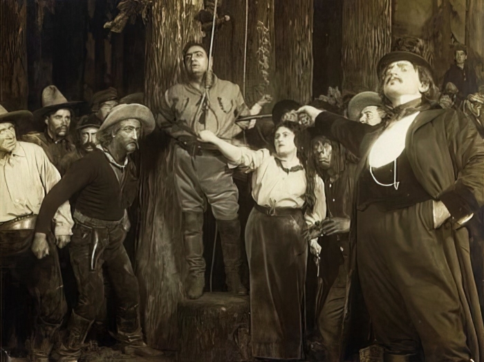 Enrico Caruso, Emmy Destinn i Pasquale Amato u trećem činu <em>Čeda Zapada</em> na praizvedbi 19. prosinca 1910.